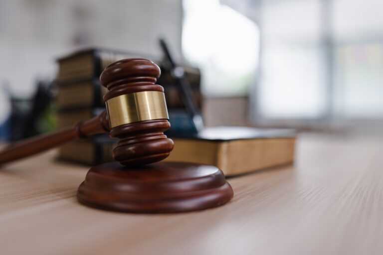 Abbott, Boston Scientific Oppose Spinal Cord Stimulator Lawsuit MDL