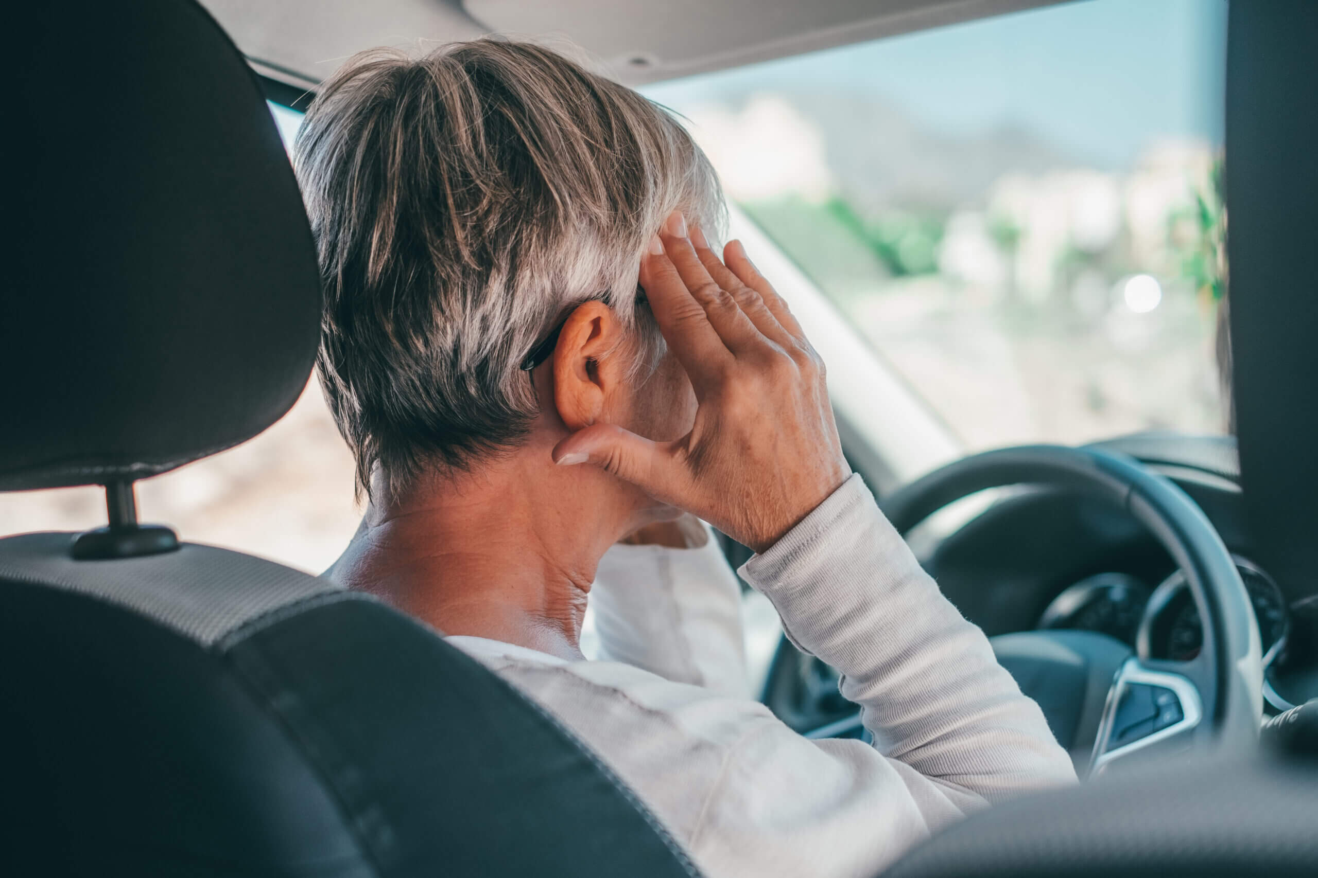 Elder-Driver-Migraine-Headache-Car-Crash